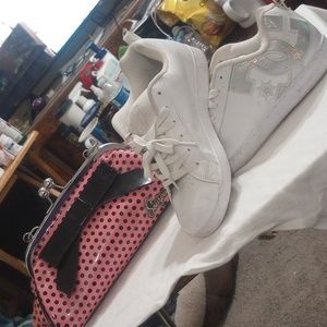 Pink sourpuss purse and DC shoes co USA size 9 purse shows a little ware on hand